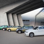 Row of BMW electric vehicles from past 40 years